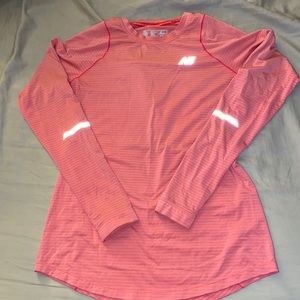 Used new balance “seasonless” long sleeve in pink striped size small